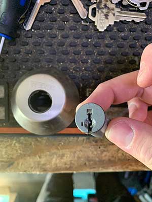 Replacing lock cylinder within Weiser Lock